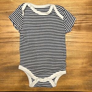 Carter’s navy and white onesie NEW in newborn size